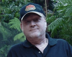 Casual man outdoors in black shirt